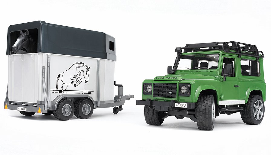 Машинка BRUDER Джип Land Rover Defender с прицепом для перевозки лошадей + лошадка, М1:16, 02592