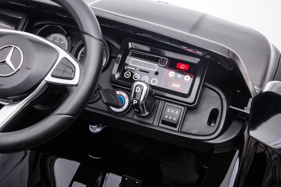 Электромобиль LeanToys Mercedes DK-MT950 4x4 лакированный 2х12 В